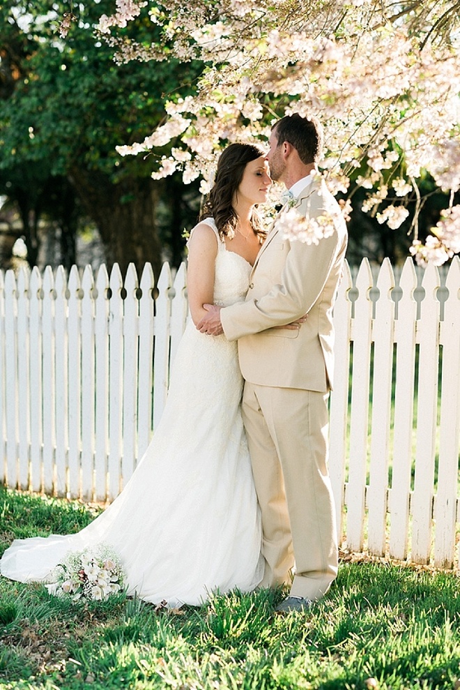 Gorgeous bride and groom, during their backyard wedding