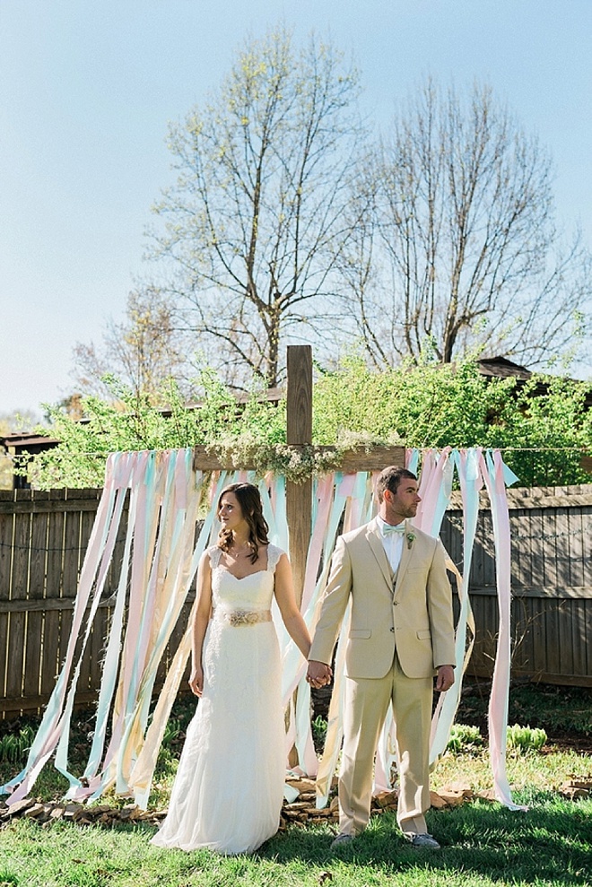 Gorgeous bride and groom, during their backyard wedding