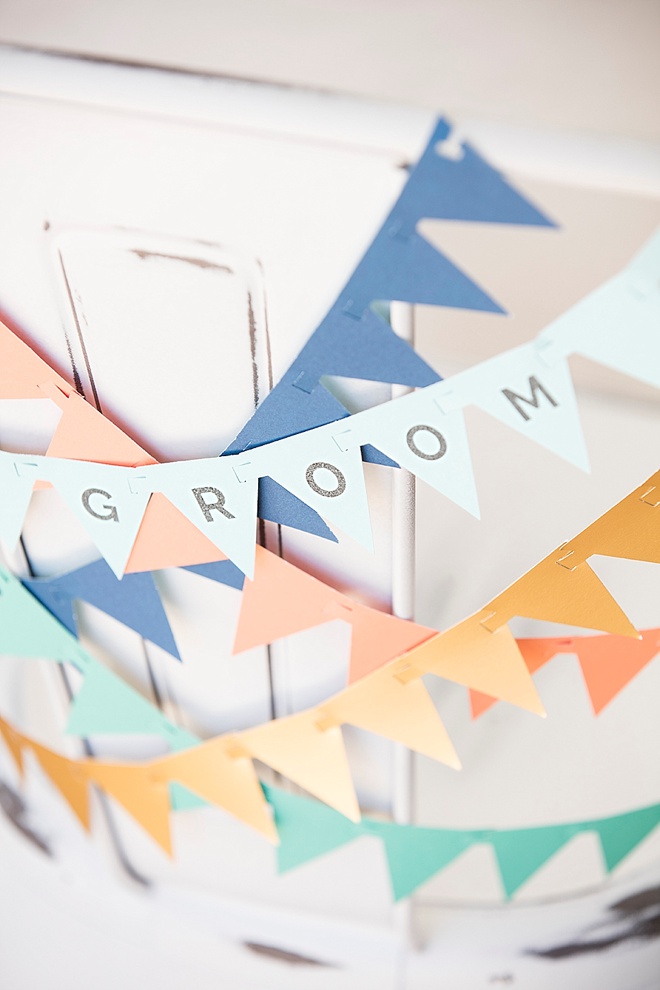 Adorable, DIY bunting flag banner for your wedding reception chairs!