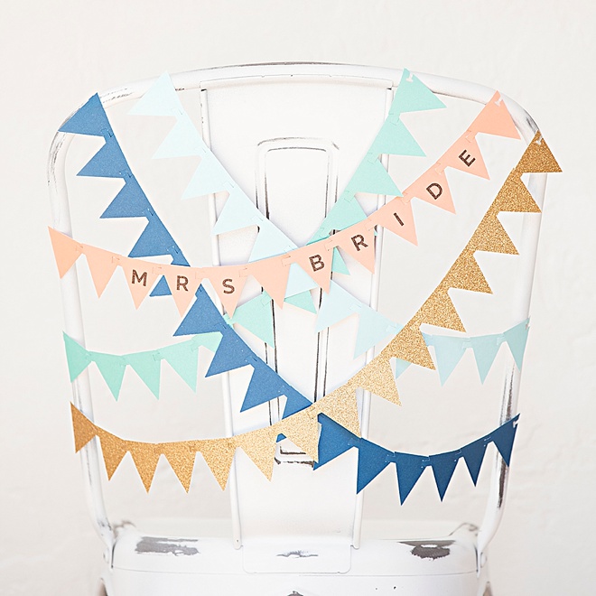 Adorable, DIY bunting flag banner for your wedding reception chairs!