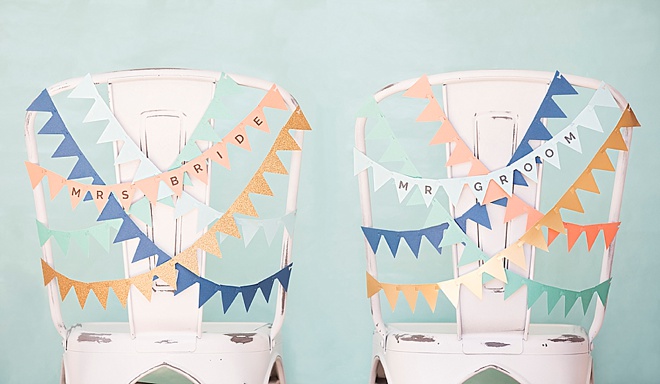 Adorable, DIY bunting flag banner for your wedding reception chairs!
