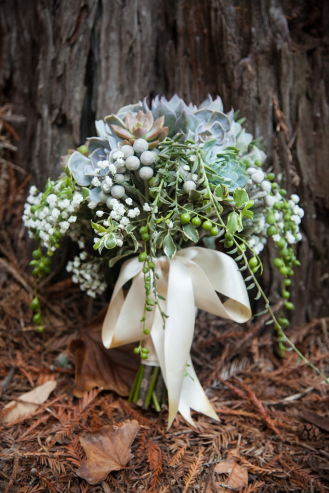 Stunning succulent wedding bouquet with long ribbons