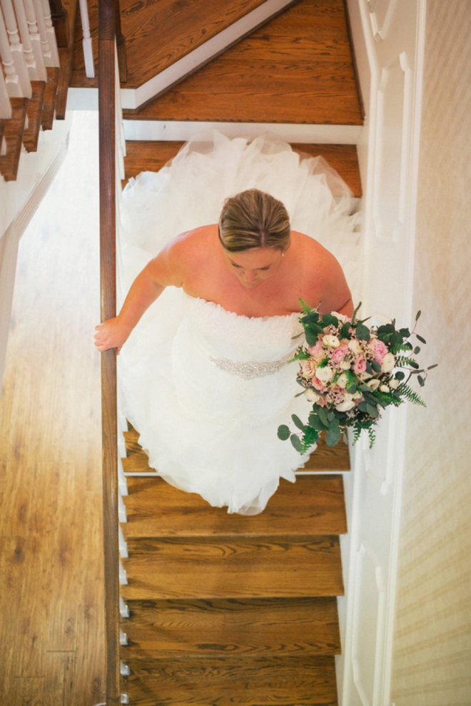 Bride getting ready, walking to first look