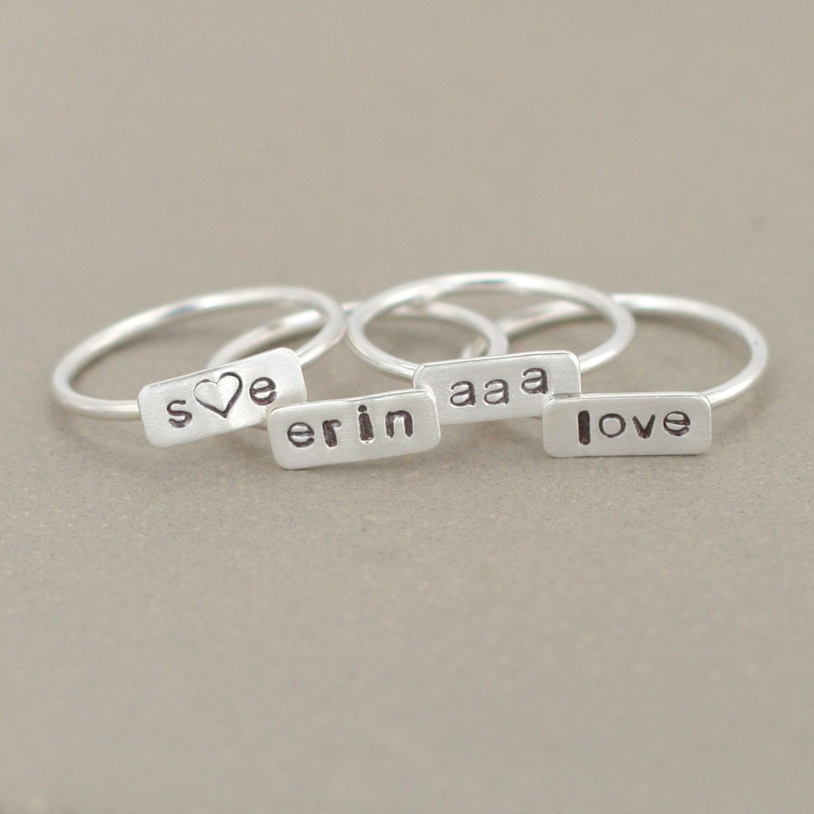 Custom, hand stamped silver rings - would make great bridesmaid gifts!