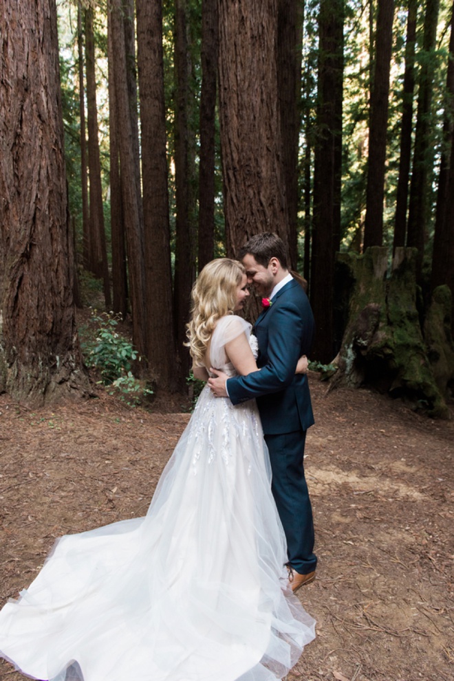 Gorgeous shot of the bride and groom in the forest!