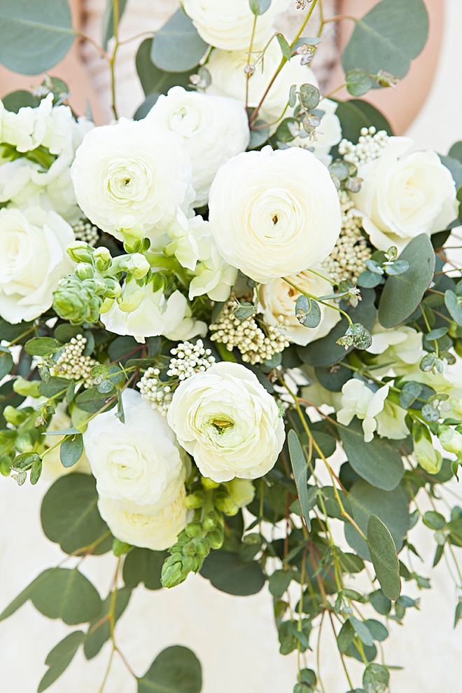 Gorgeous DIY eucalyptus and ranunculus wedding bouquet