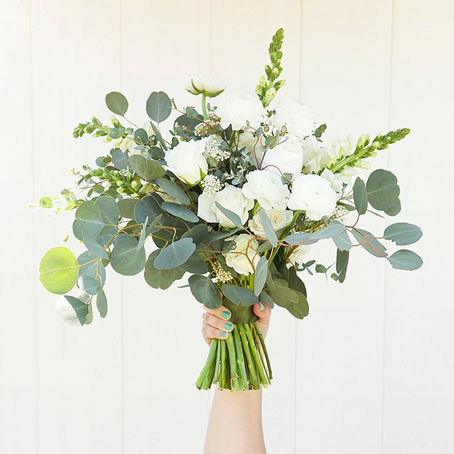 Gorgeous DIY eucalyptus and ranunculus wedding bouquet