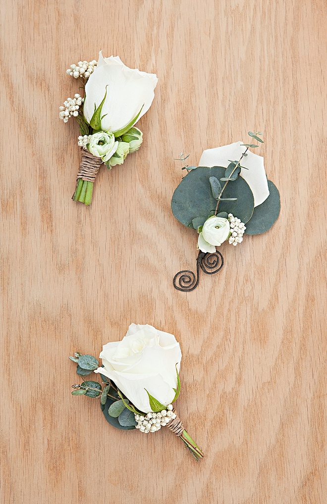 Gorgeous DIY eucalyptus and ranunculus wedding boutonnieres