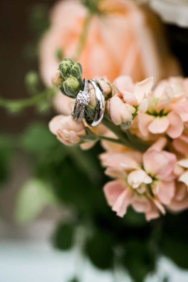 Gorgeous wedding ring shot on bouquet flowers