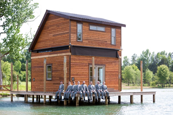 Groom and his men hanging out on a dock