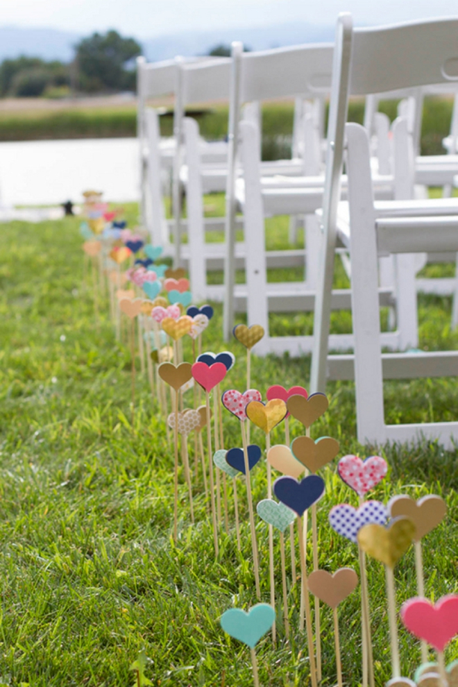 Hearts on sticks as wedding aisle decor!