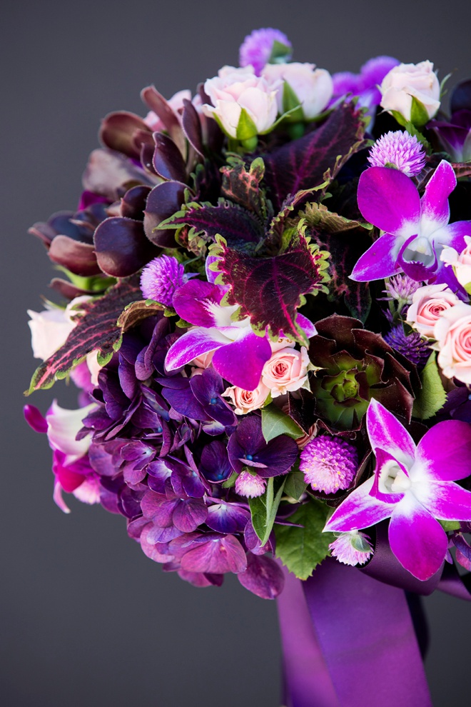 Stunning dark purple bridal bouquet with pops of pale pink mini-roses!