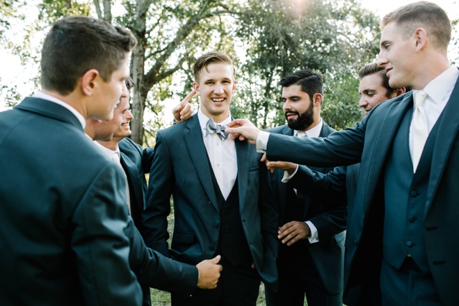 Handsome groom and his men in modern tuxes