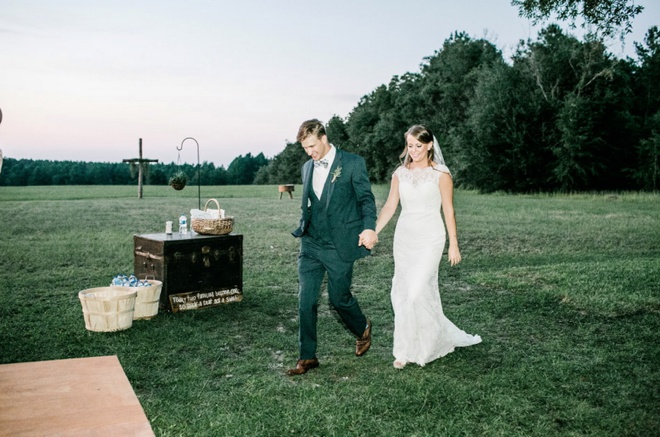 Bride and groom walking to their reception