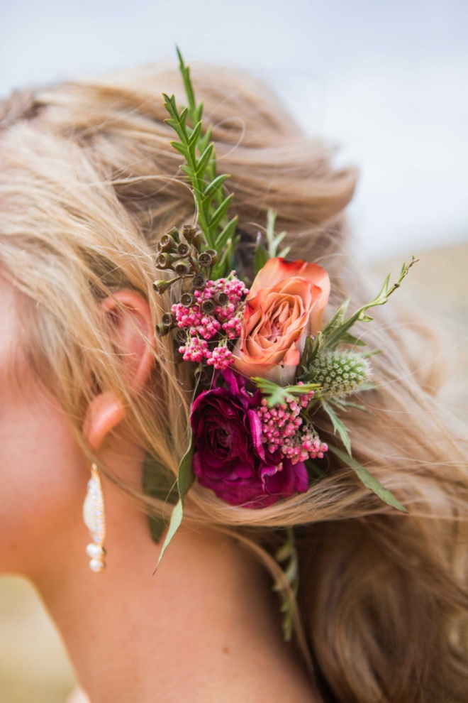 Beautiful wedding hair with flower detail.