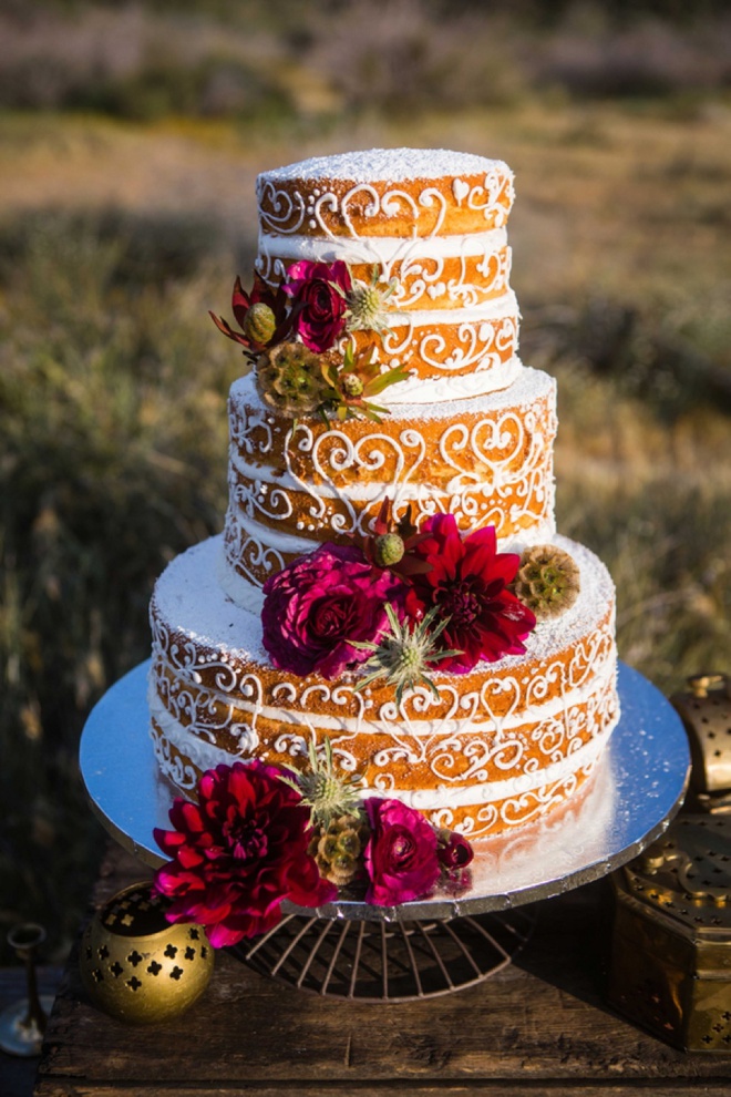 Naked wedding cake with frosting details