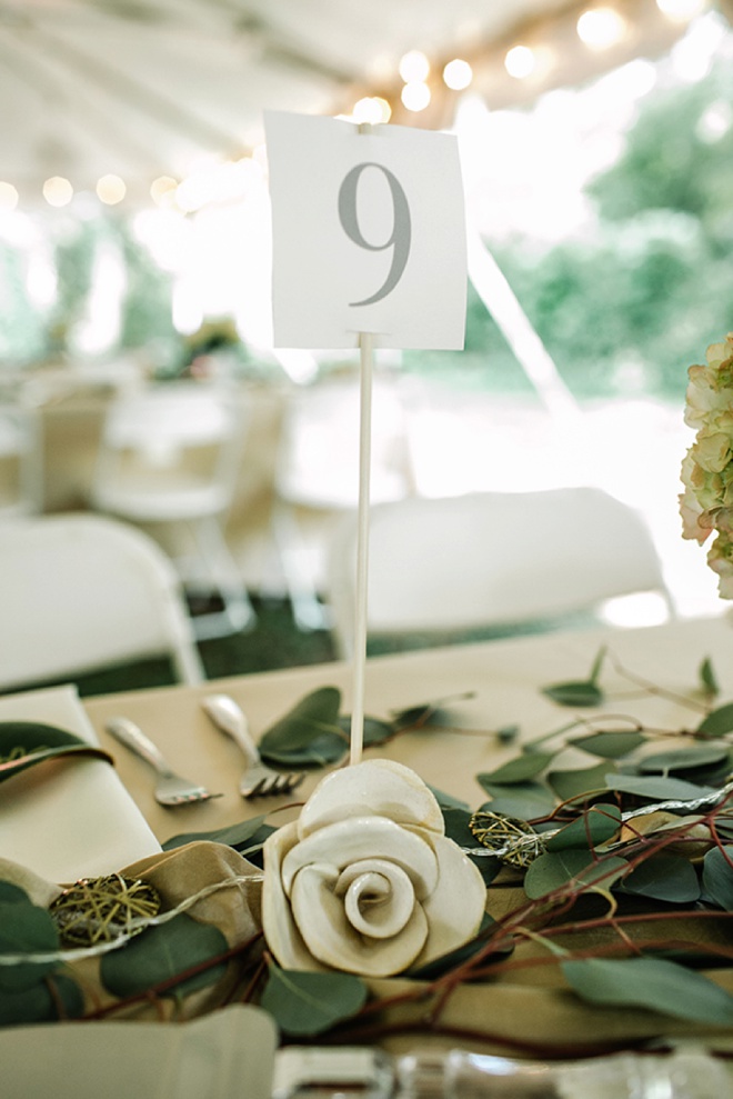 Handmade pottery table number stands!
