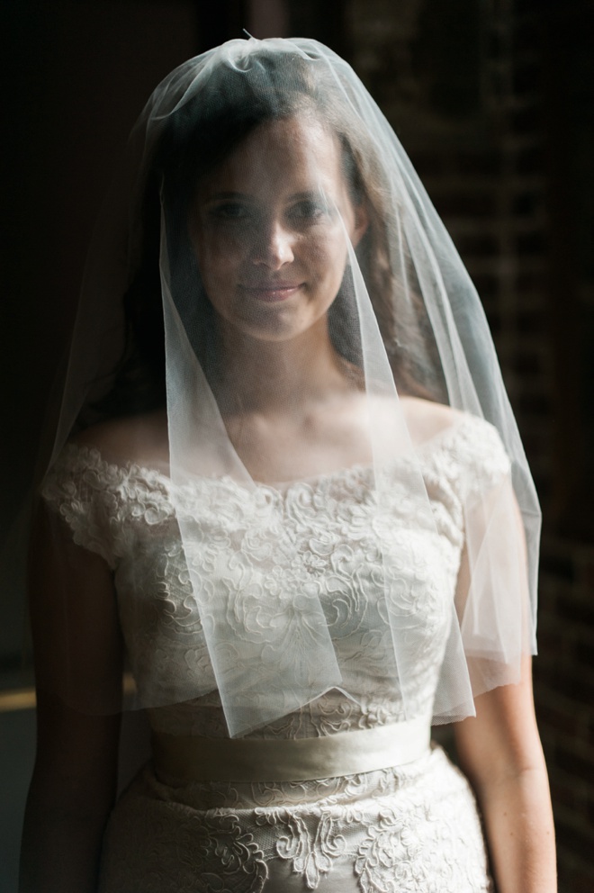Bride looking stunning with her blusher veil.