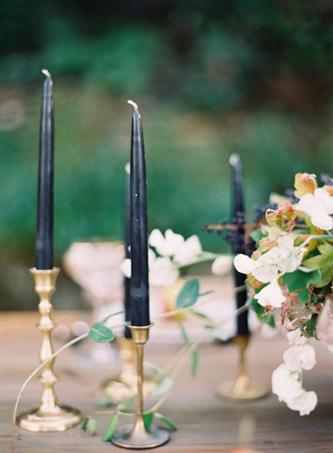 Gorgeous navy blue taper candles in gold holders!