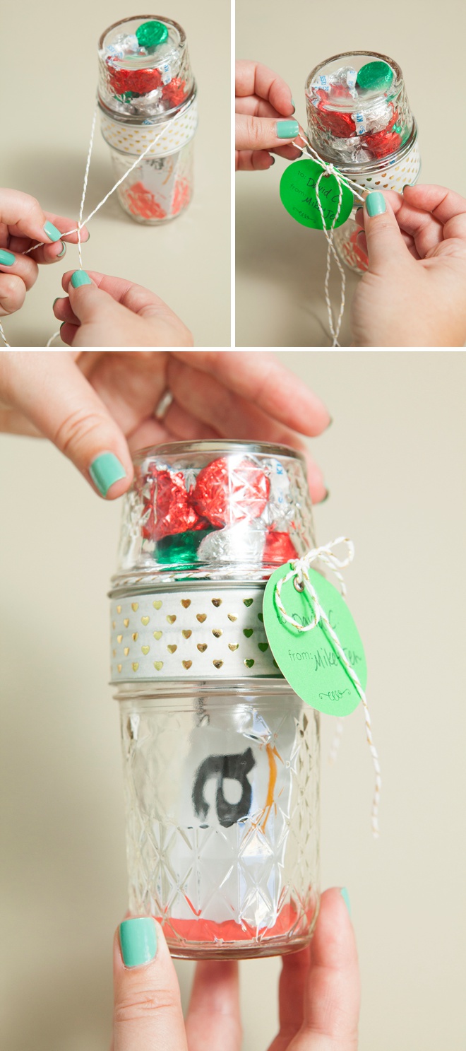 Glue two mason jar lids together to make the most darling gift card and candy holder!