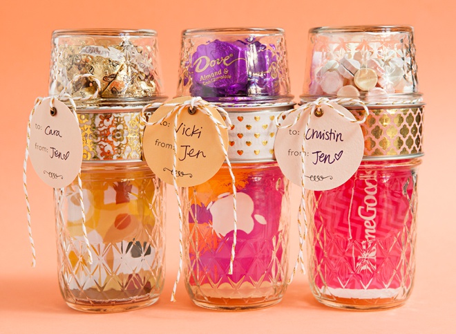 Glue two mason jar lids together to make the most darling gift card and candy holder!