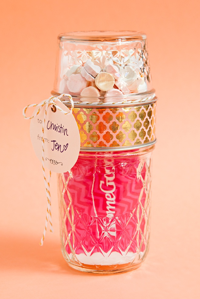 Glue two mason jar lids together to make the most darling gift card and candy holder!