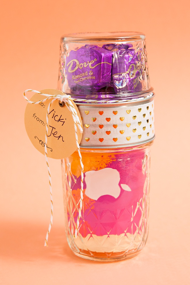 Glue two mason jar lids together to make the most darling gift card and candy holder!