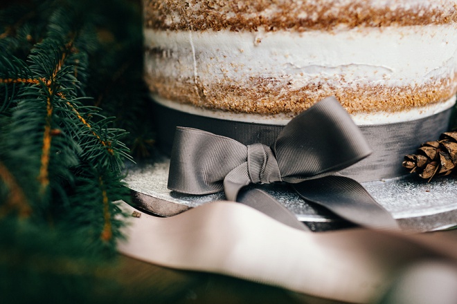 Adorable grey ribbon tied rustic wedding cake!