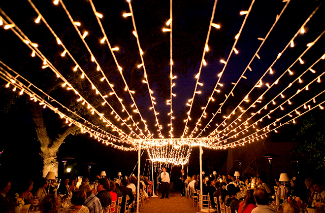Line the aisle of the reception with twinkle lights