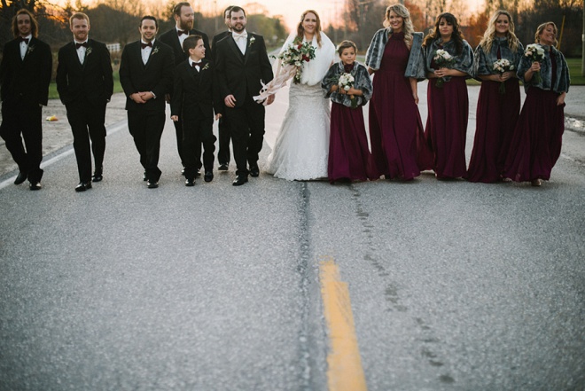 Love this darling shot of the bride, groom and their bridal party!