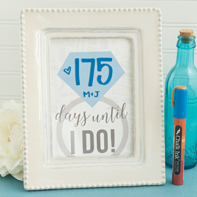 Adorable DIY wedding countdown sign using wet wipe Chalk Ink markers!