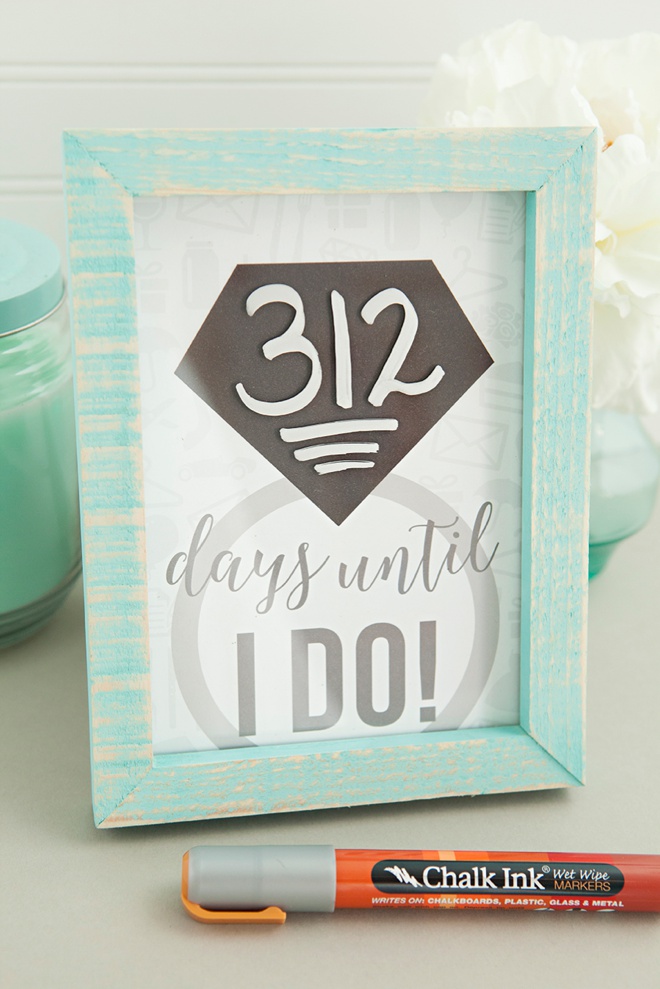 Adorable DIY wedding countdown sign using wet wipe Chalk Ink markers!