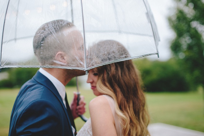 We're loving this rainy wedding and the gorgeous umbrella shots! So gorgeous!