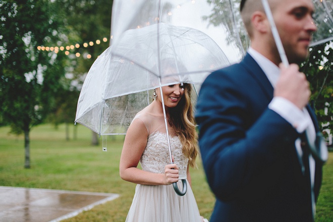 We're loving this rainy wedding and the gorgeous umbrella shots! So gorgeous!