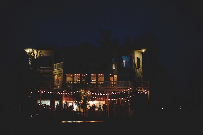 Swooning over this gorgeous twinkle lit backyard wedding reception!
