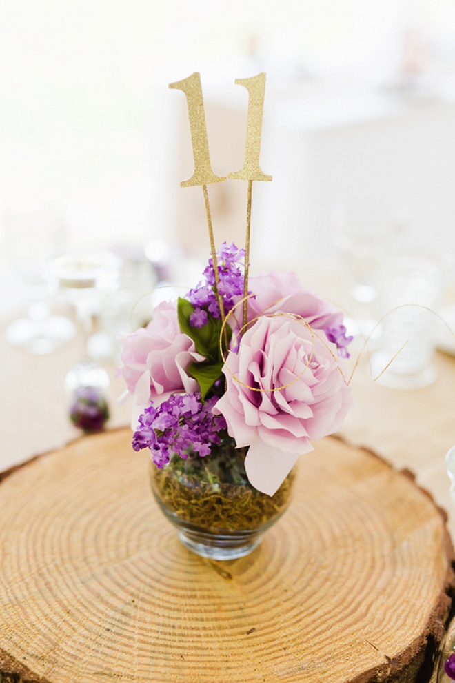 We love these gorgeous centerpices at this DIY wedding!