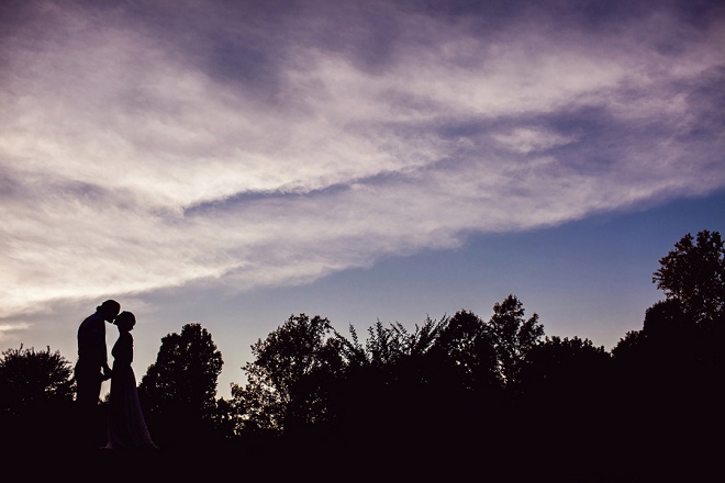 Love this gorgeous sunset photo at this darling backyard wedding!