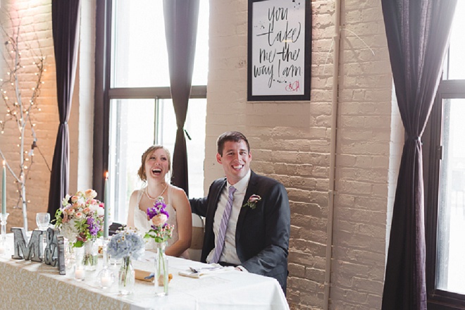 We're loving this fun shot of the Bride and Groom at their sweetheart table!