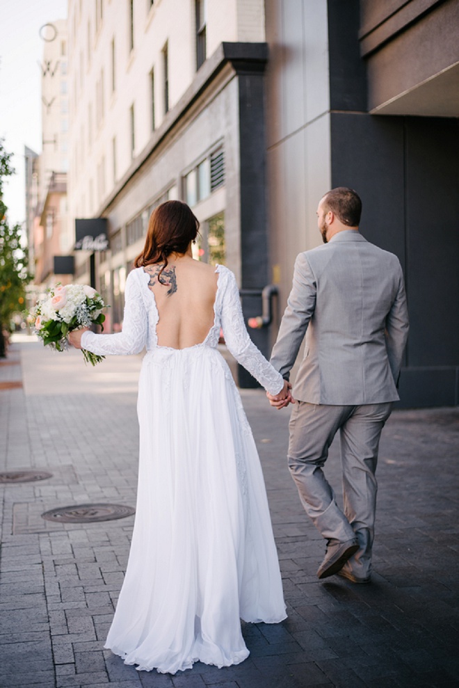 We're swooning over this first look and the Bride's long sleeve dress!