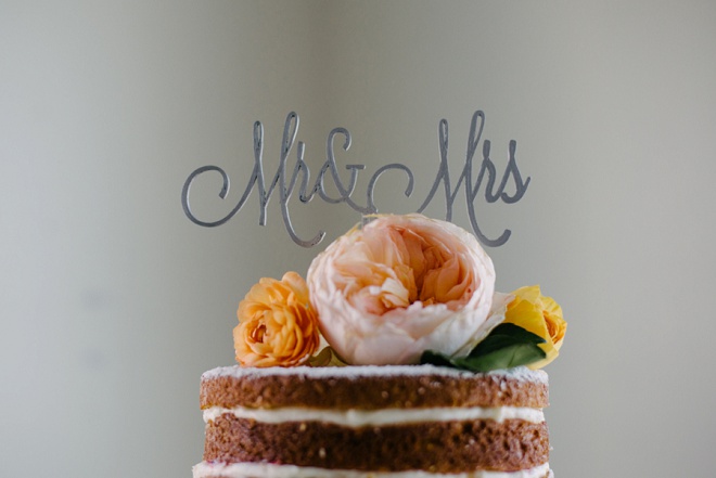 How gorgeous is this naked cake with Mr and Mrs cake topper?! Swoon!