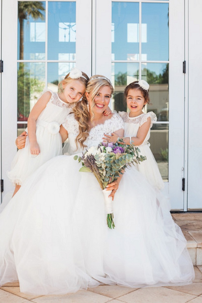 How darling is this photo of the Bride and her flower girls?! So sweet!