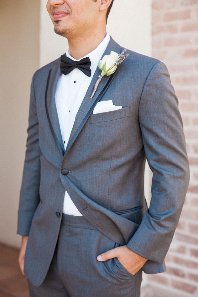 We're loving this handsome Groom's wedding style and bow tie!