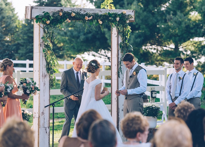 We're swooning over this gorgeous outdoor barn wedding ceremony!