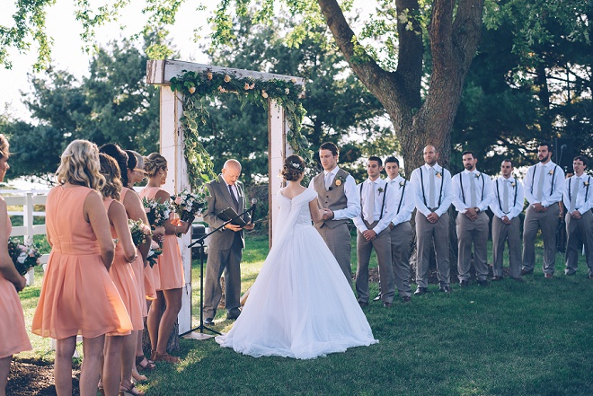 We're swooning over this gorgeous outdoor barn wedding ceremony!