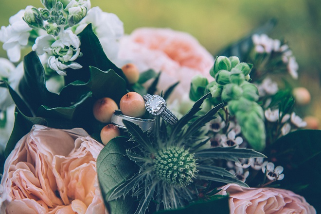 We're swooning over this gorgeous bouquet and ring shot!
