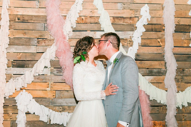 We're loving this gorgeous shot of the Bride and Groom in their DIY photo booth!