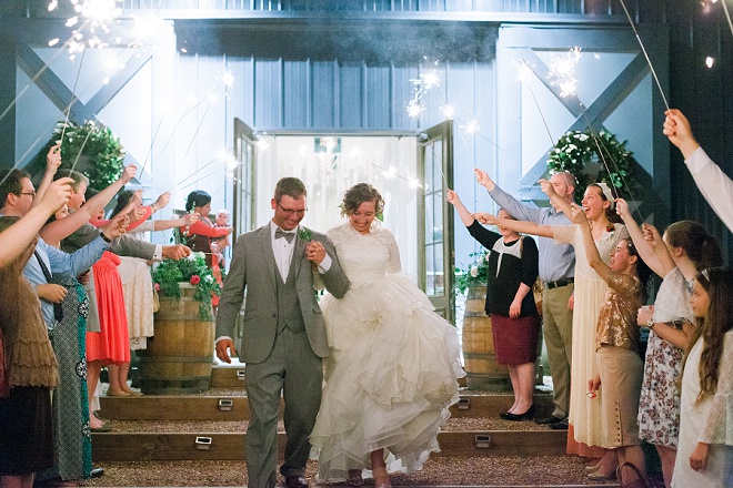 Swooning over this gorgeous sparkler exit at this boho wedding!