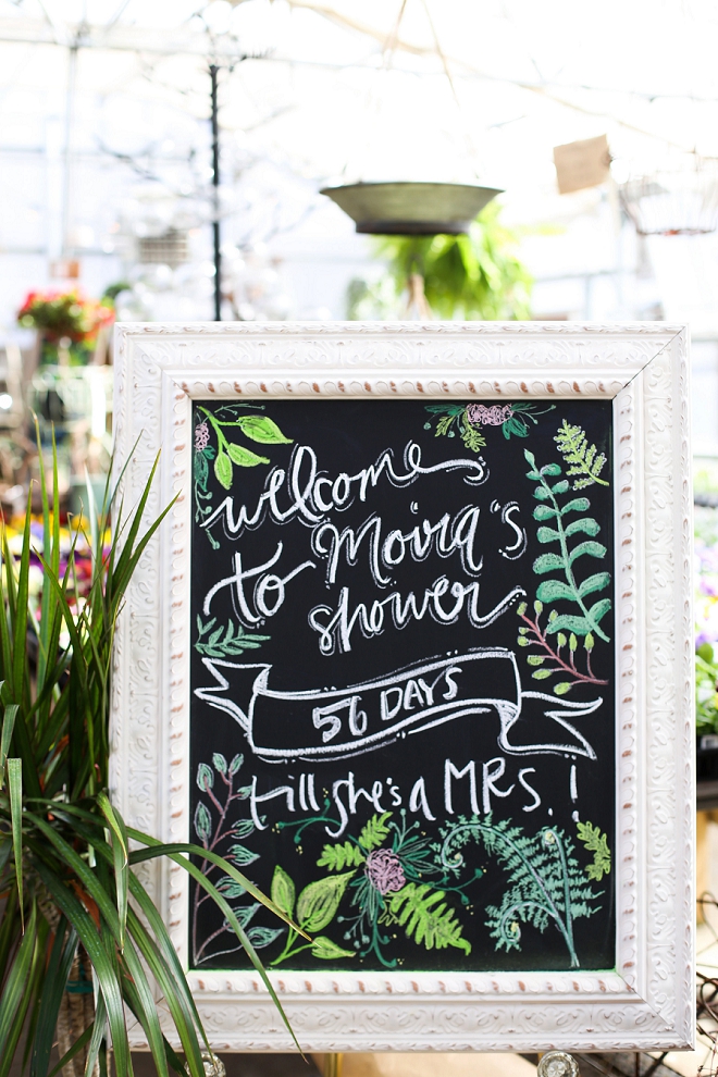 We love this gorgeous hand lettered chalkboard for this DIY garden bridal shower!