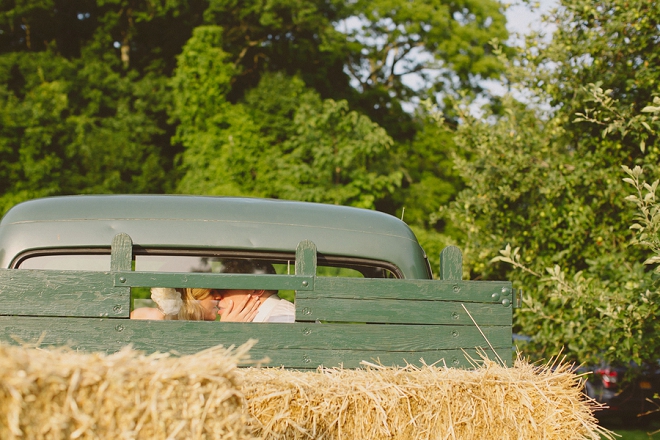 How fun is this Bride and Groom kissing shot in their vintage truck! So fun!