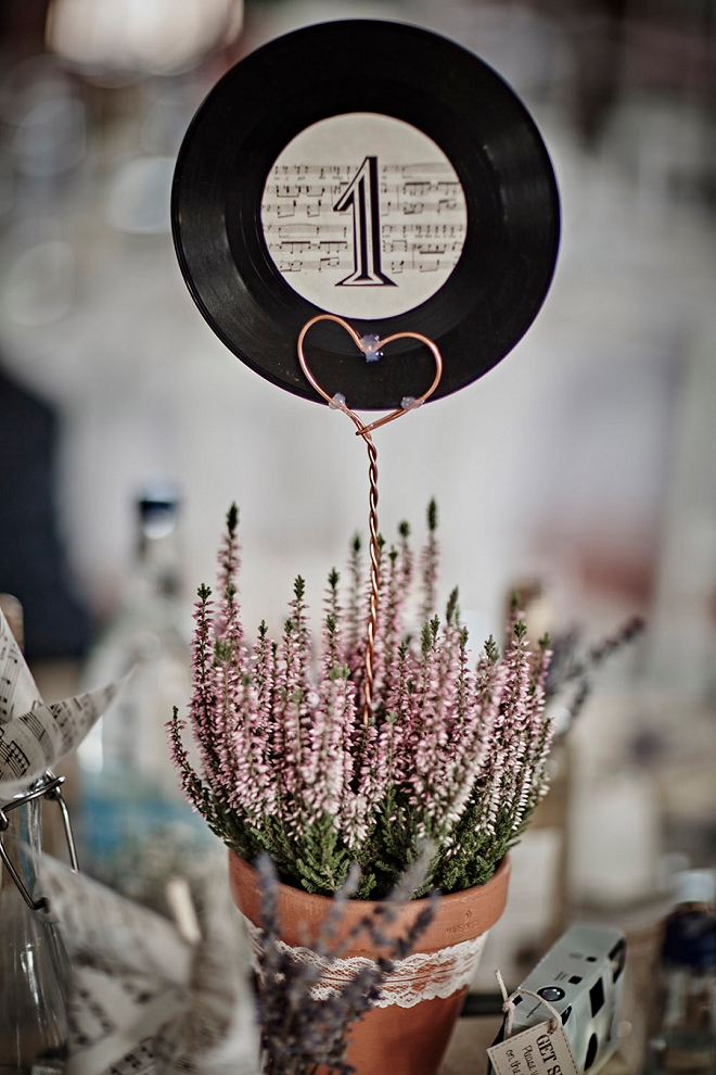 We're loving these record table numbers! Such a great wedding DIY for music lovers!